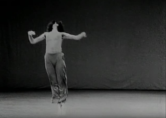 Still from the 1978 film of Trisha Brown performing "Watermotor" by Babette Mangolte 