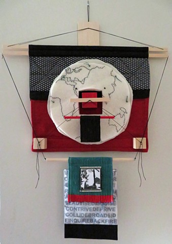 fiber art wall hanging made with fabric, wood and thread influenced by Japanese aesthetics  by Rebecca Stuckey