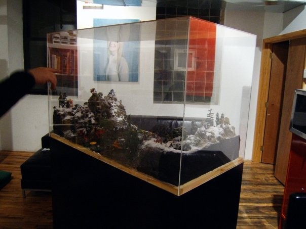 Blood Lake, paint, pewter gaming figurines, miniature landscape-building materials, 2008. 