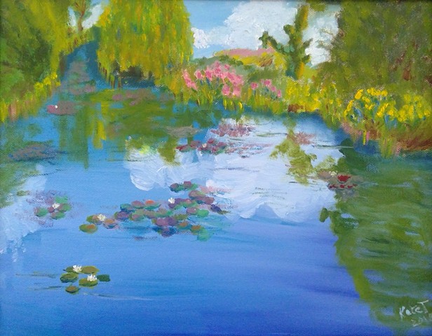 A view of a water garden at Monet's home in Giverny, cloud reflection