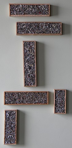 Fordalite pieces in salvaged wood frames mixed media sculptures