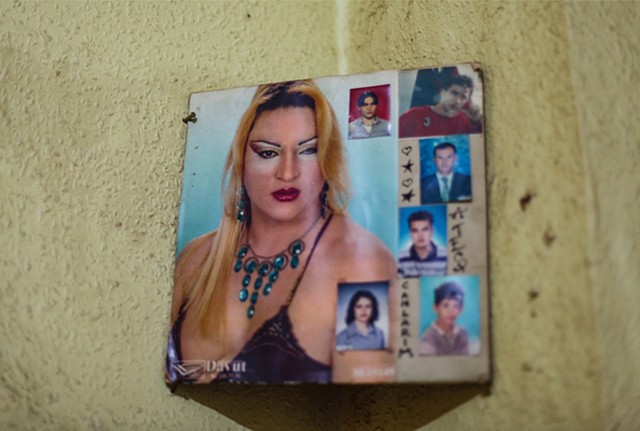 Angel's glamour shots, of which she's very proud, hang in harmony with some photos of her past school days and others of family members from home in Russia.
"This is who I've always been," she says of her new appearance. "My family can't accept that."