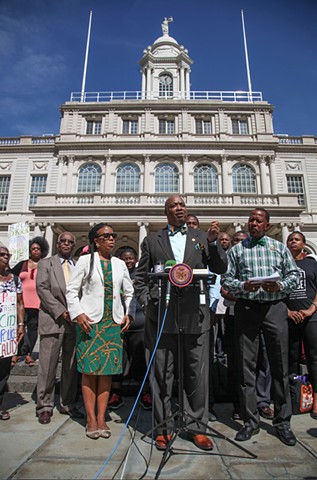 NAACP co-op City Branch President Jerome Rice, joined by Councilwoman Laurie Cumbo and Councilman Andy King, speaks at a press conference at City Hall concerning tennis star James Blake's wrongful arrest on September 16, 2015.