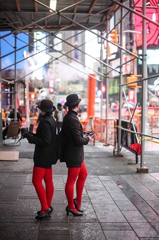 Even with increased security in New York following the terrorism attacks in Paris just two days prior, tourism remains normal in Times Square on November 15, 2015.