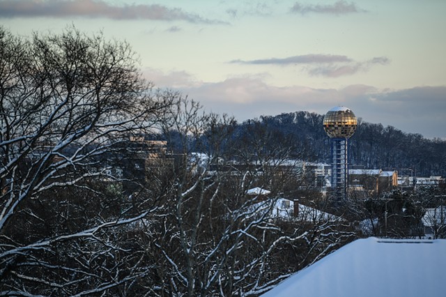 The Sunsphere gleams in the setting sun over a snow-covered downtown Knoxville following the city's heaviest snowstorm in many years, Tuesday, Jan. 16, 2024.