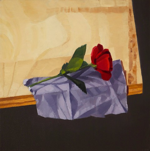 A still life painting of a red rose on a purple cloth on wooden table