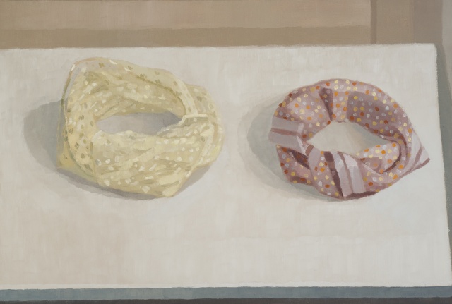 A still life painting of two scarves wrapped in circles on a table