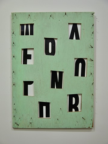 Wood wall sculpture with windows, letters
