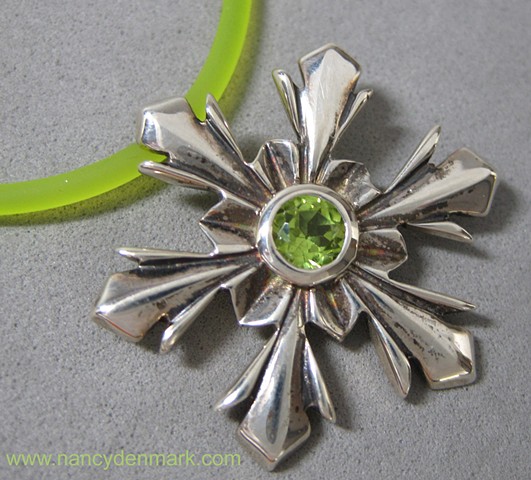 sterling silver snowflake pendant with peridot © Nancy Denmark