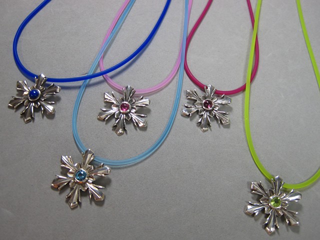 snowflake pendants by Nancy Denmark