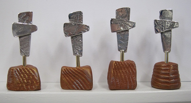 small sterling replica crosses on polymer clay stands