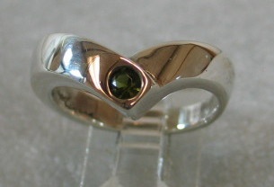 Green Tourmaline gemstone set in sterling ring designed by Nancy Denmark