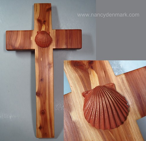 cedar cross made by Margaret Bailey with shell symbol by Nancy Denmark