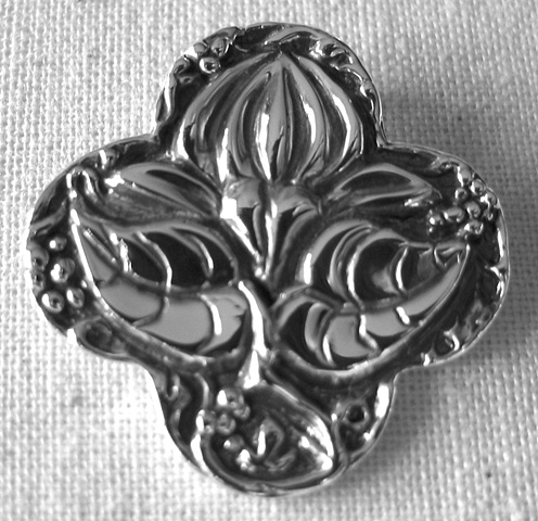 sterling silver quatrefoil pendant with lotus design by Nancy Denmark