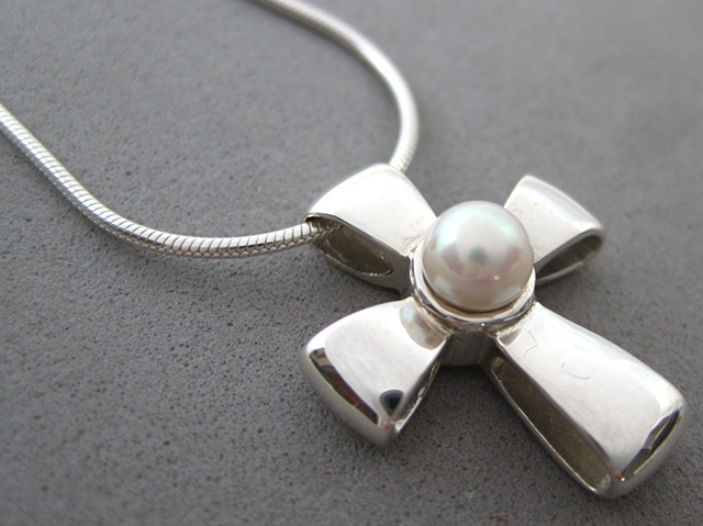 sterling silver ribbon cross with pearl by Nancy Denmark