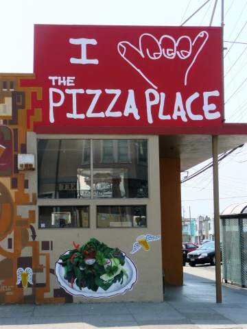 Store front signage for The Pizza Place