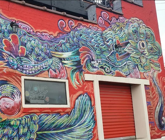 A mural that celebrage and pays homage to the background of the area which used to be the chinatown in Houston.