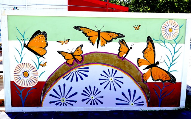Villa Arcos mural by Angel Quesada. Butterfly tacos on flower tortillas