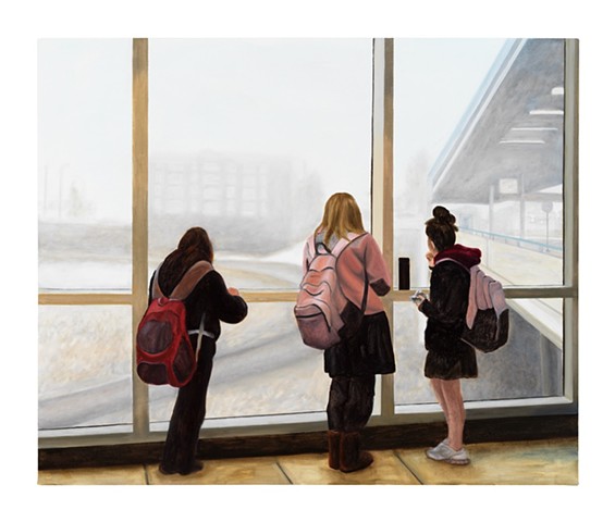 Three teen girls waiting at a transit hub