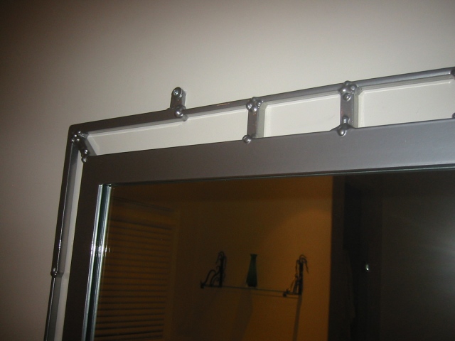 contemporary mirror detail with chrome finish