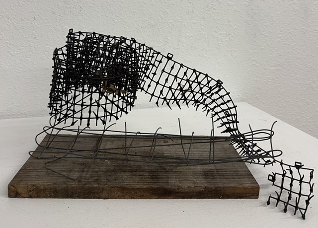 Found materials arranged by weight and gravity