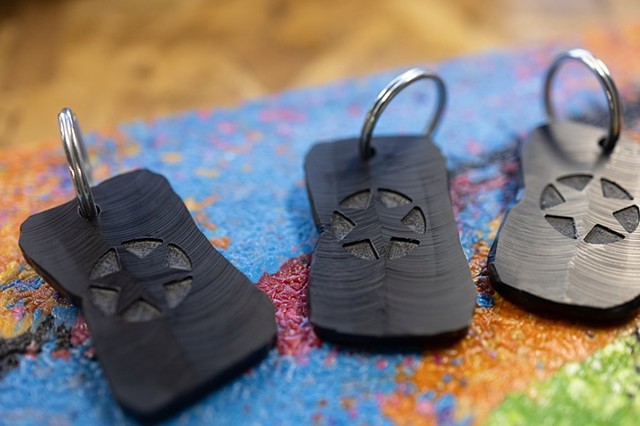Engraved keychains made of post-consumer HDPE #2 Plastic for Redemptive Plastics