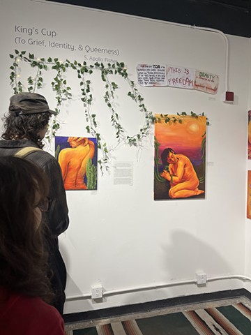 Attendants with Paintings