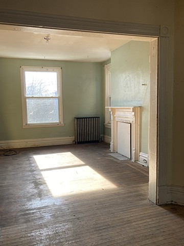 2nd floor. View into the front most south facing room.