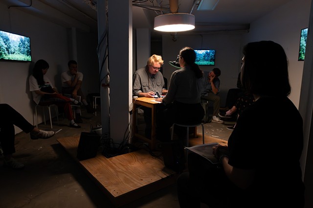 View of embedded stage with Rachel and James at the table