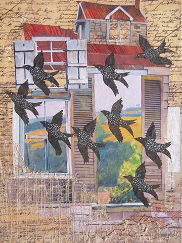 Blackbirds fly past a derelict building
