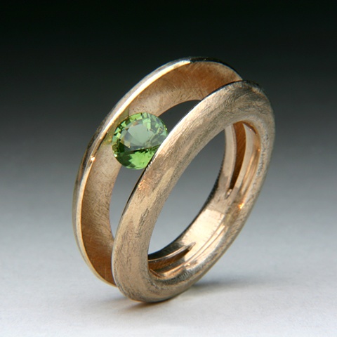 Tension set Green Tourmaline set in a Custom Alloy Ring