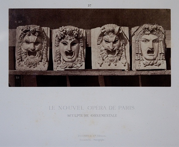 FOUR ORNAMENTAL STONE MASKS FOR THE "NEW" PARIS OPERA, 1872