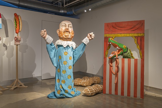 Self Portrait as hand puppet  next to Punch and Judy Crocodile (with sausages)

Photo credit:  Jaime Alvarez