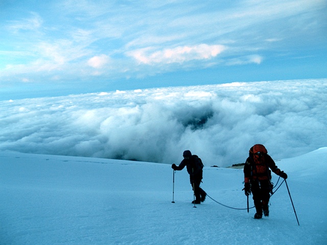 Climbers Above the Clouds