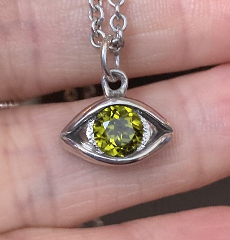 olive green, peridot, evil eye, insect ark, swans, dana schecter