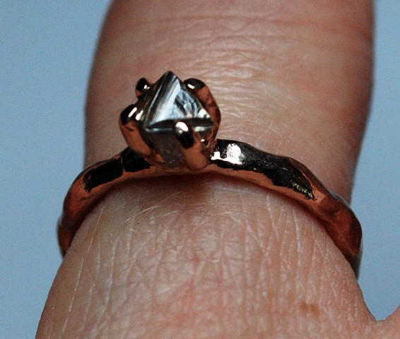 Raw diamond engagement ring.