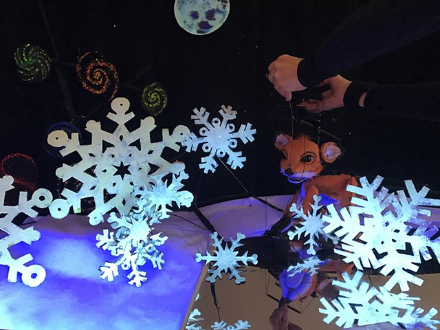 Fox marionette with snowflakes
