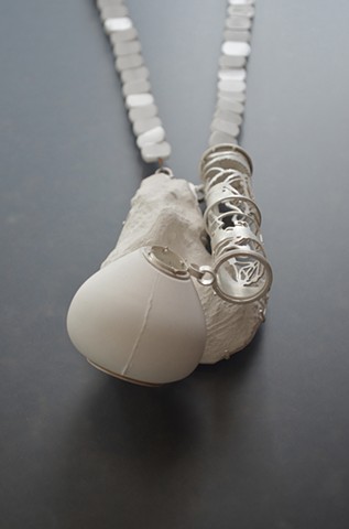 art jewelry contemporary necklace alternative materials Chauvet cave comet hourglass