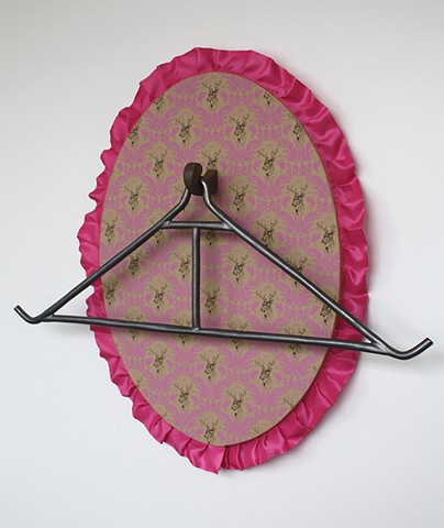 the gambrel, hoist, or spreader