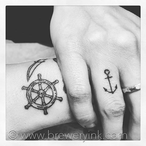 nautical anchoe and ships wheel mini tattoos