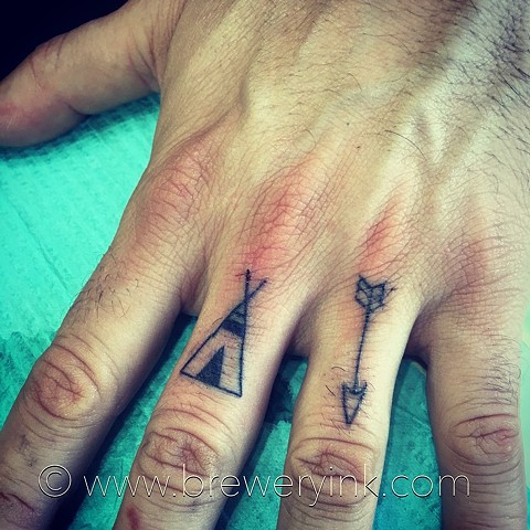 tipi and arrow finger tattoos