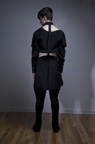 Back of black seamed puzzle shirt