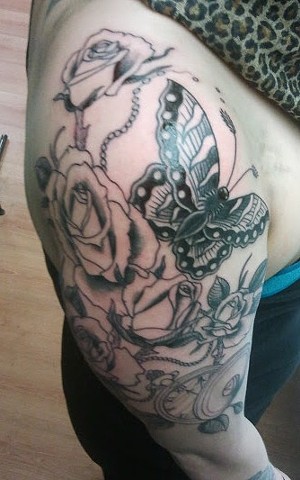 Watch, moth and roses
