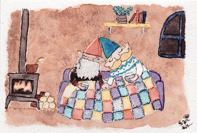 A watercolour painting of two gnome husbands snuggled down under a patchwork blanket on the sofa in their cottage. One has a red pointed hat and a big grey beard, the other has a blue pointed hat and a big blonde moustache. They are drinking cocoa and hol