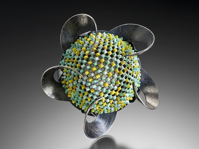 Contemporary art jewelry brooch of vitreous enamel by Wendy McAllister.