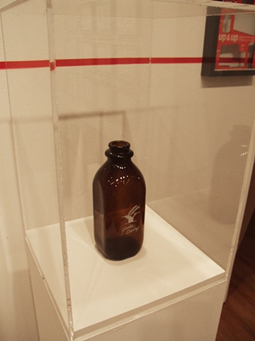 milk bottle (year unknown), installation shot

