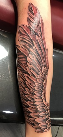 Wing on forearm