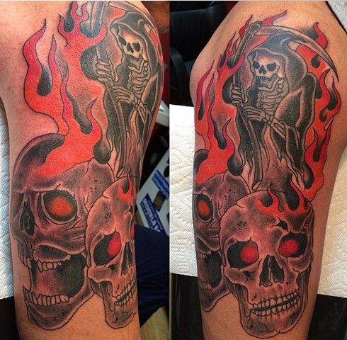 Redue of the 25 year old Reaper & Flames,
I added the skulls.