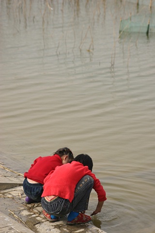 Playing by Tuanbo Lake