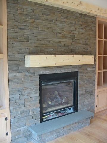Cultured stone gas frieplace.